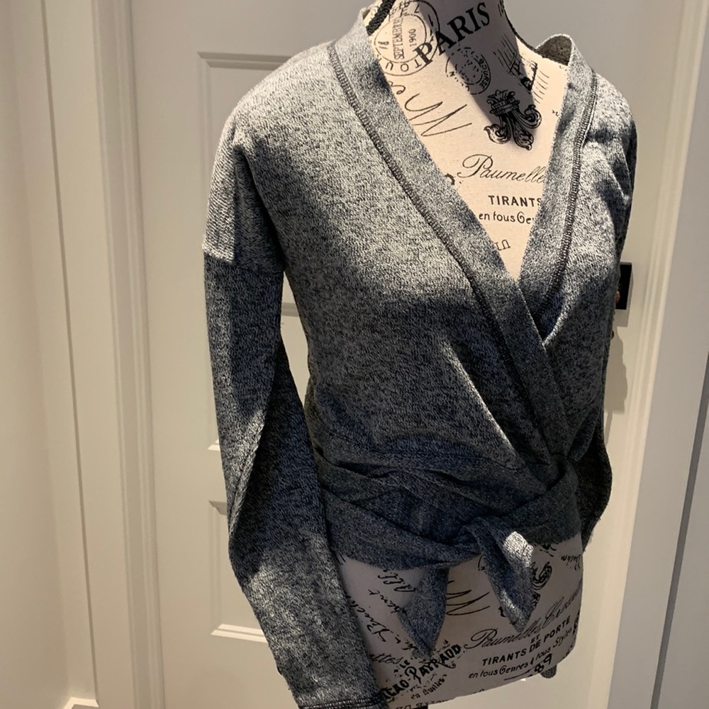 Wrap around top; size small, but tag of brand and size was cut off